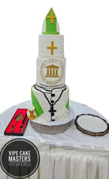 Tall white church confirmation cake with green stole, gold crosses and Memorial Baptist emblem